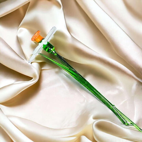 a toothbrush laying on top of a white cloth